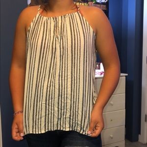 Black white and yellow tank.